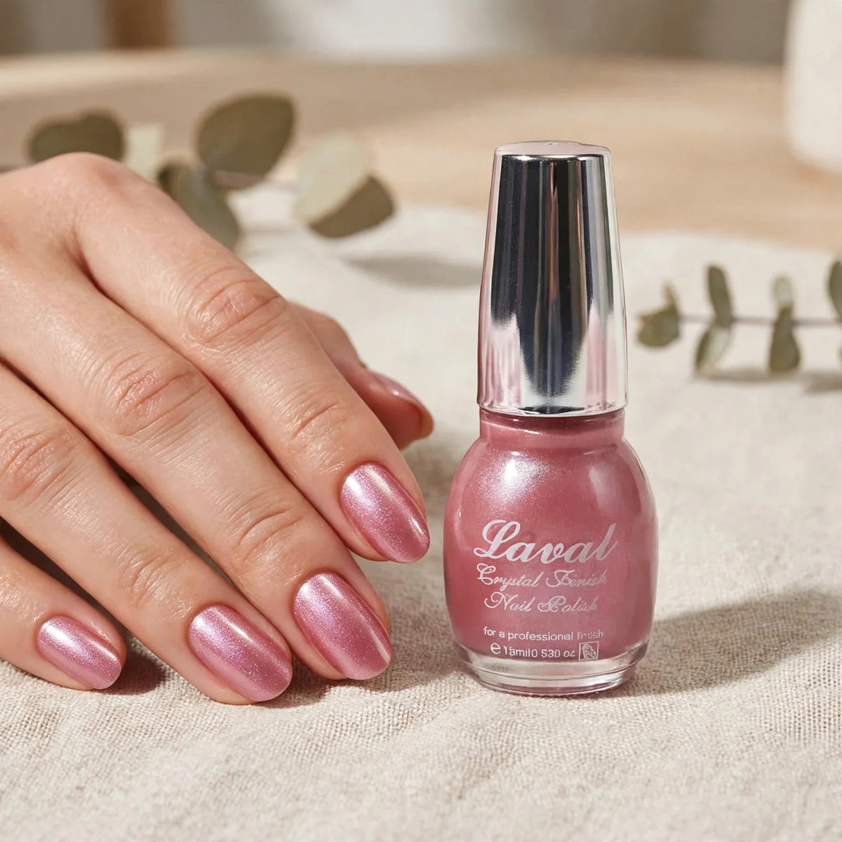 Manicure with shimmering pink nail polish suitable for any event