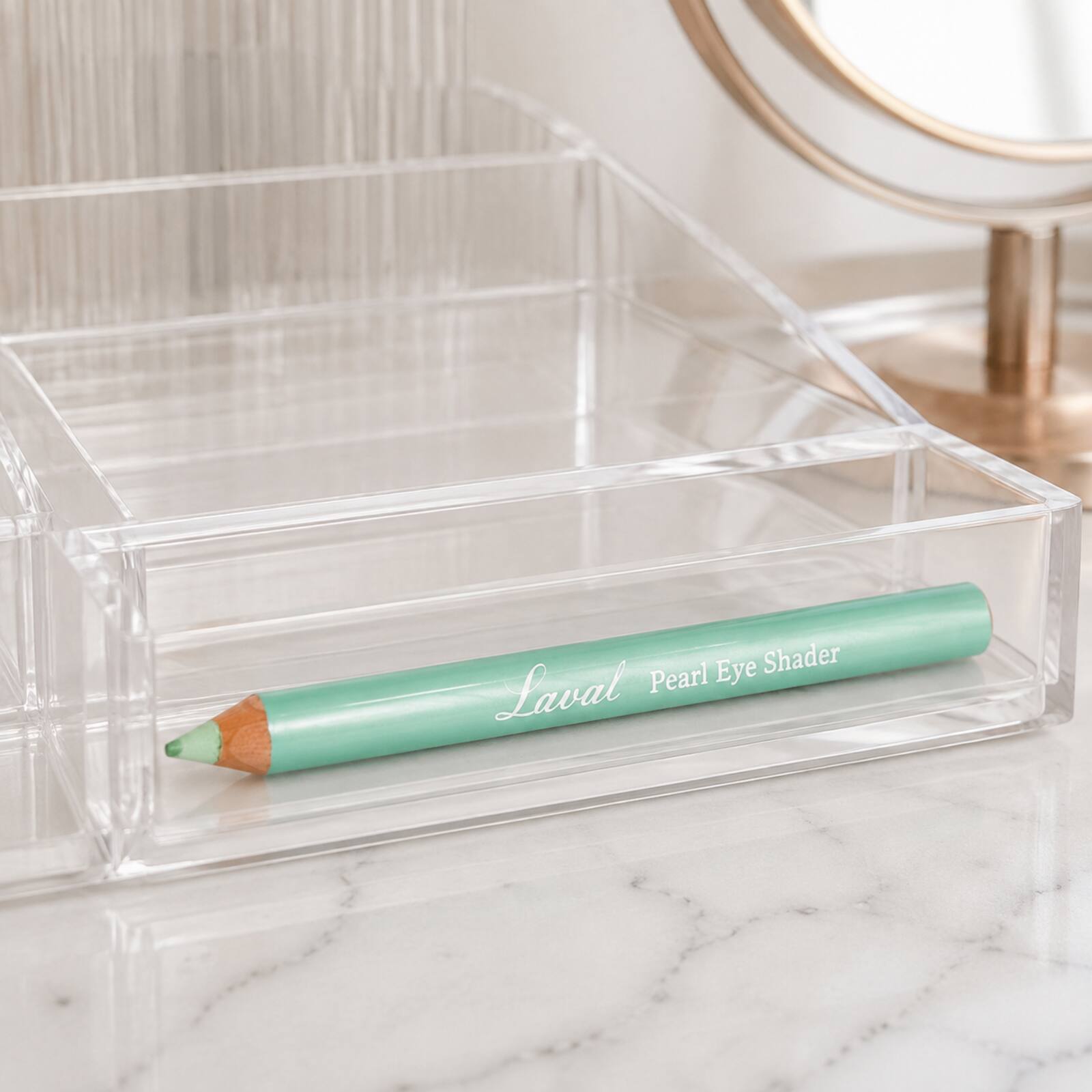 Laval green Pearl Eye Shader pencil displayed in a makeup organiser
