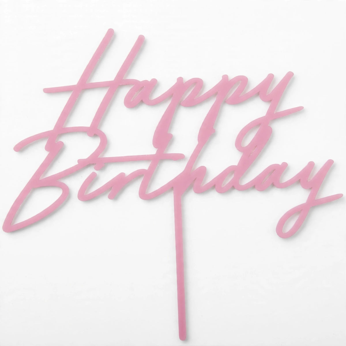 Close-up view of light pink Happy Birthday acrylic cake topper with two stakes