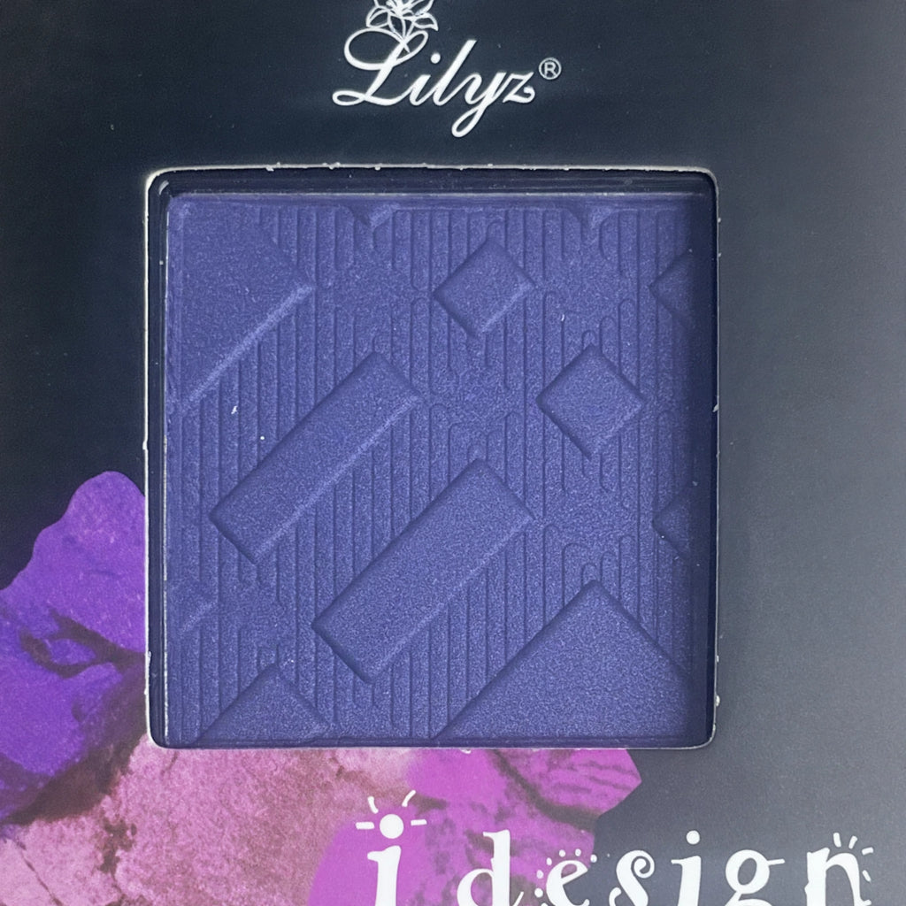 Close-up view of Lilyz Design Denim Blue pressed eyeshadow in single compact