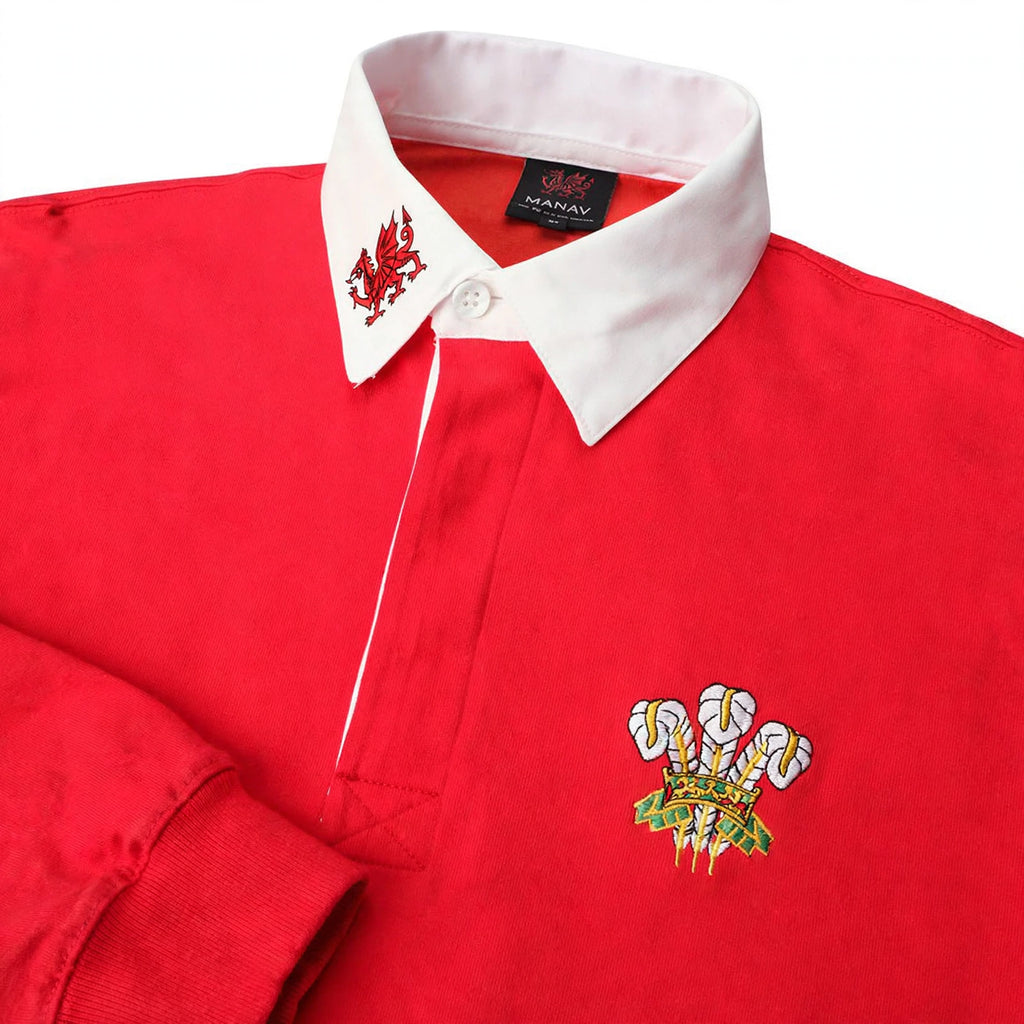 Close-up of three feathers emblem on chest of Welsh rugby shirt with button placket collar
