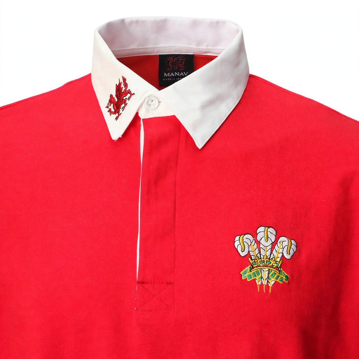 Close-up of the three feathers emblem on the chest of the Welsh rugby shirt