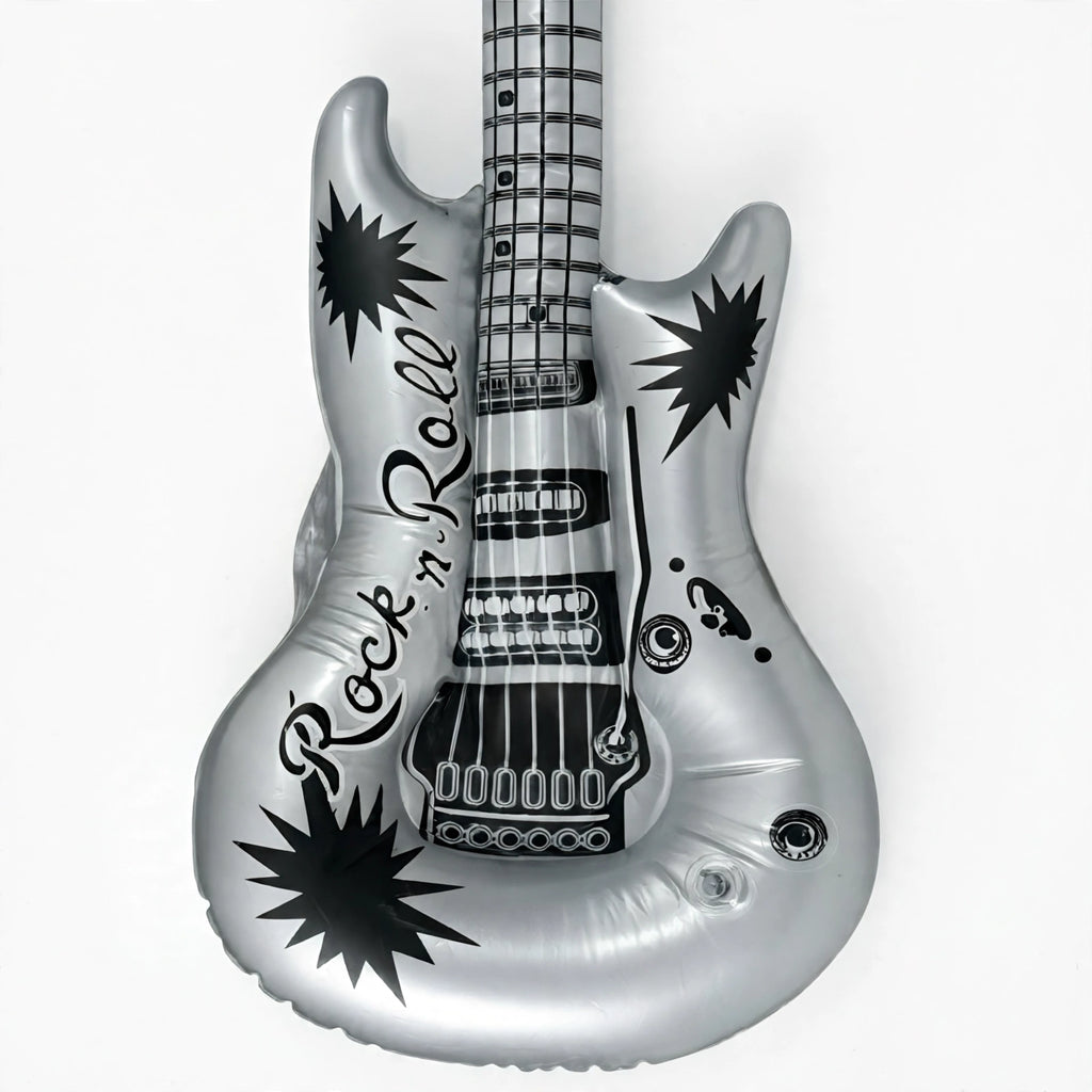Close-up view of metallic inflatable rock n roll guitar shape