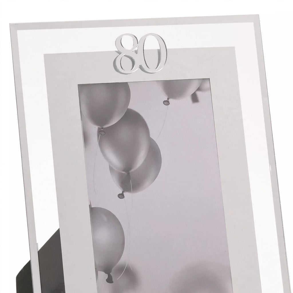 Close-up view of silver photo frame with 80th birthday inscription and 4x6 inch photo slot