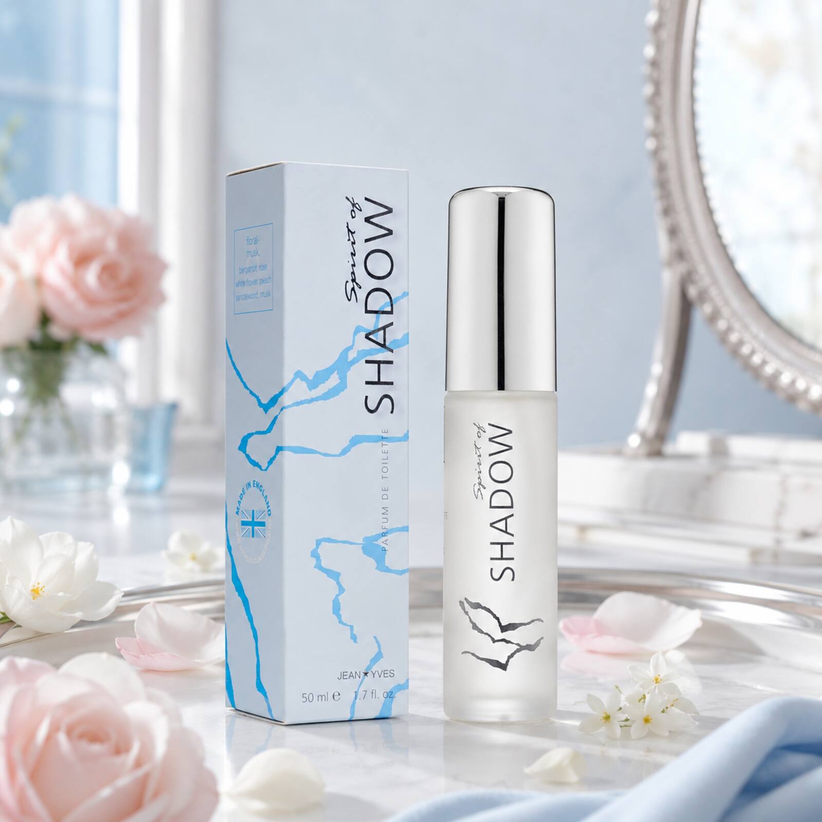 Spirit of Shadow 50ml bottle and box in a pale-blue floral vanity scene