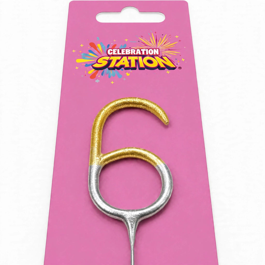 Close-up of number 6 birthday sparkler with gold and silver finish