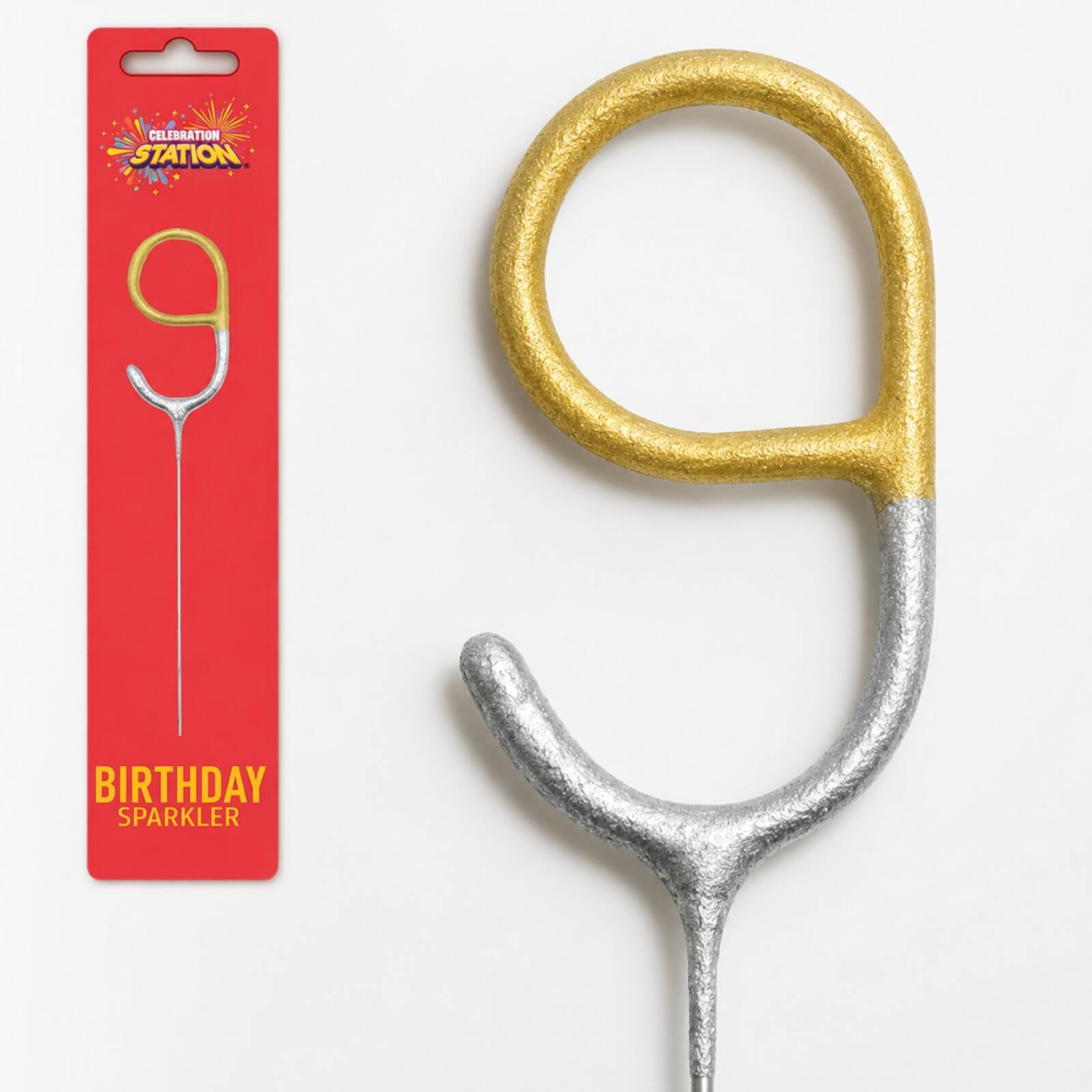 Close-up detail of gold and silver number 9 birthday sparkler with red package