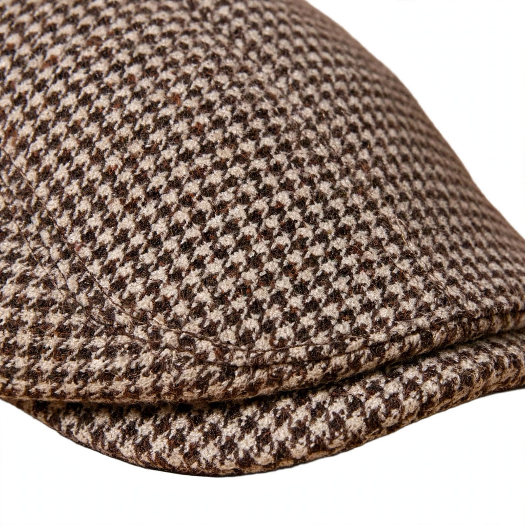 Close-up view of Old Man Faux Tweed Cap showing houndstooth pattern and fabric texture