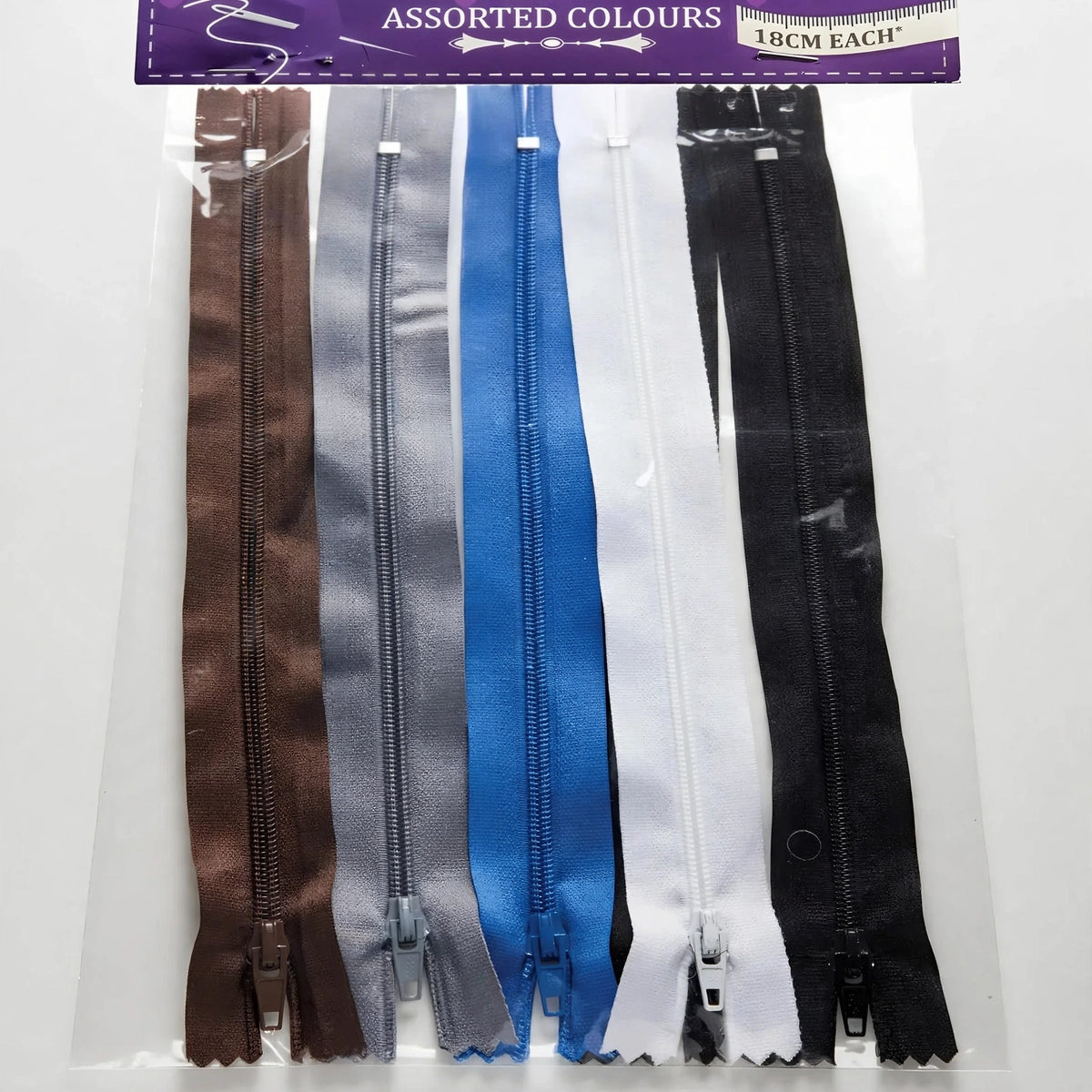 Close-up view of assorted colour zips in 18cm length