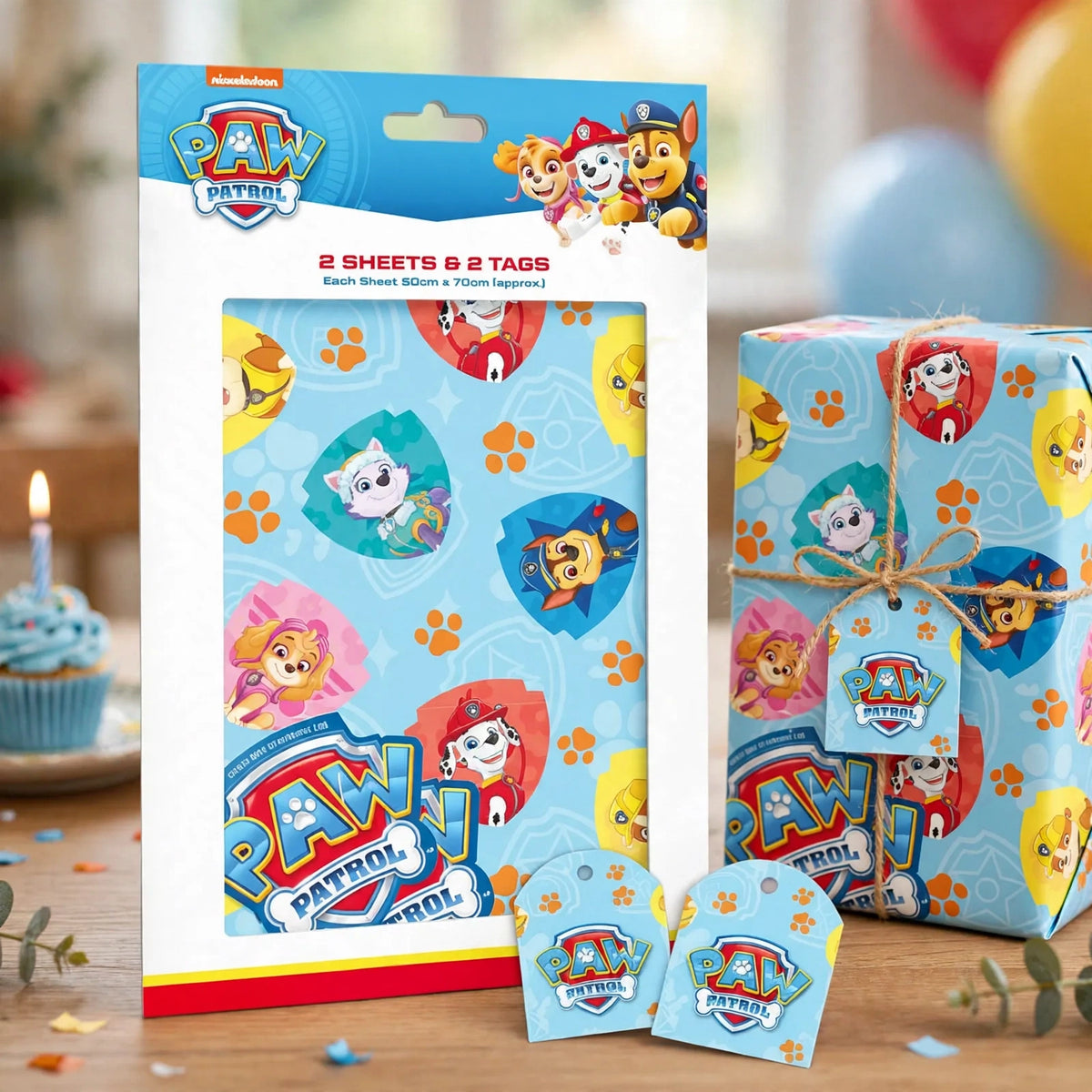 Wrapped birthday gift using Paw Patrol wrapping paper and matching gift tags