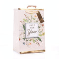 Small gift bag with multi-coloured flowers design for perfume or aftershave bottles