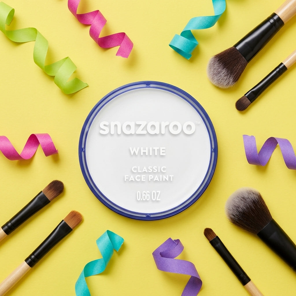 A round tin of Snazaroo Classic Face Paint in White, surrounded by colorful curly ribbons and makeup brushes on a bright yellow background.