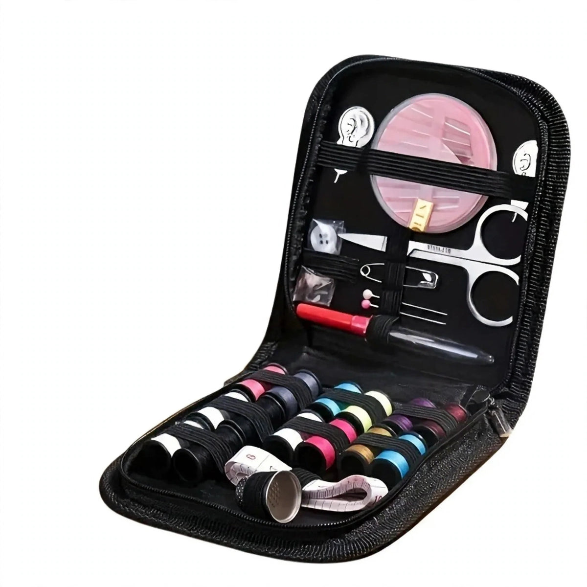 Close-up view of the portable mini travel sewing kit contents including needles, thread, buttons, and scissors