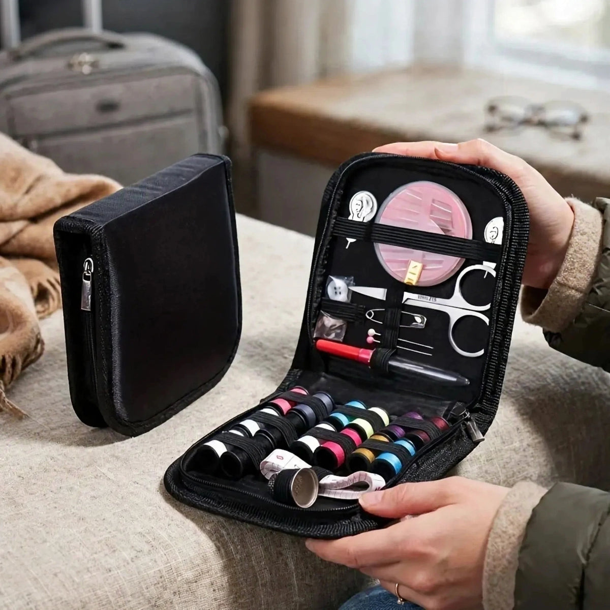 Portable mini travel sewing kit shown ready to carry in a handbag or coat pocket for travel or daily use