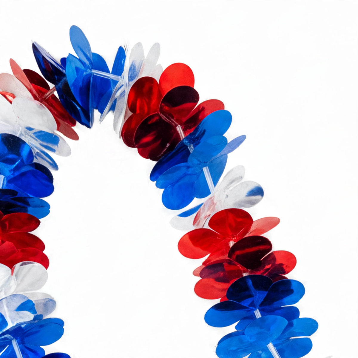 Close-up view of metallic red white and blue Hawaiian lei