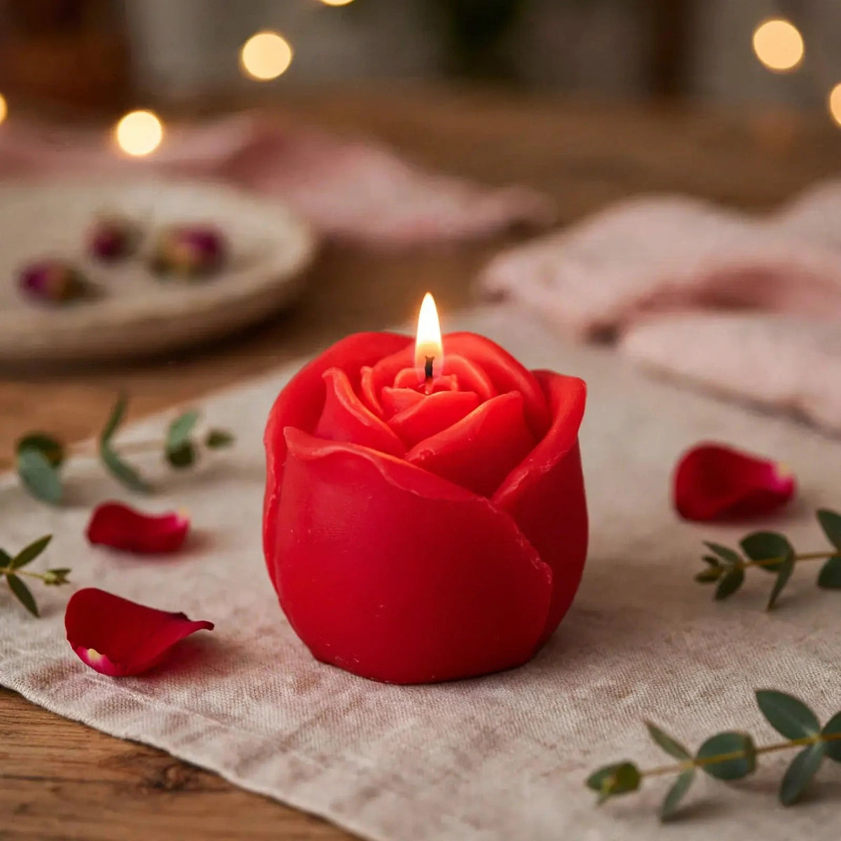 Scented rose candle displayed as a decorative accent for romantic occasions