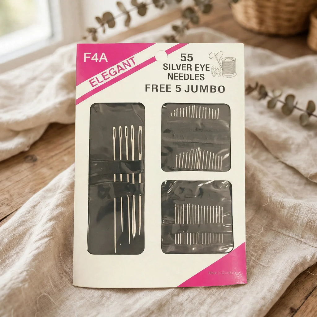 Set of 55 hand silver eye sewing needles displayed as part of haberdashery supplies
