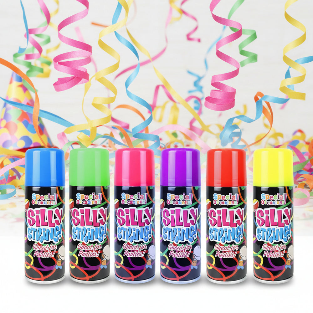 Set of six cans of 'Silly String' in different colors on a white background
