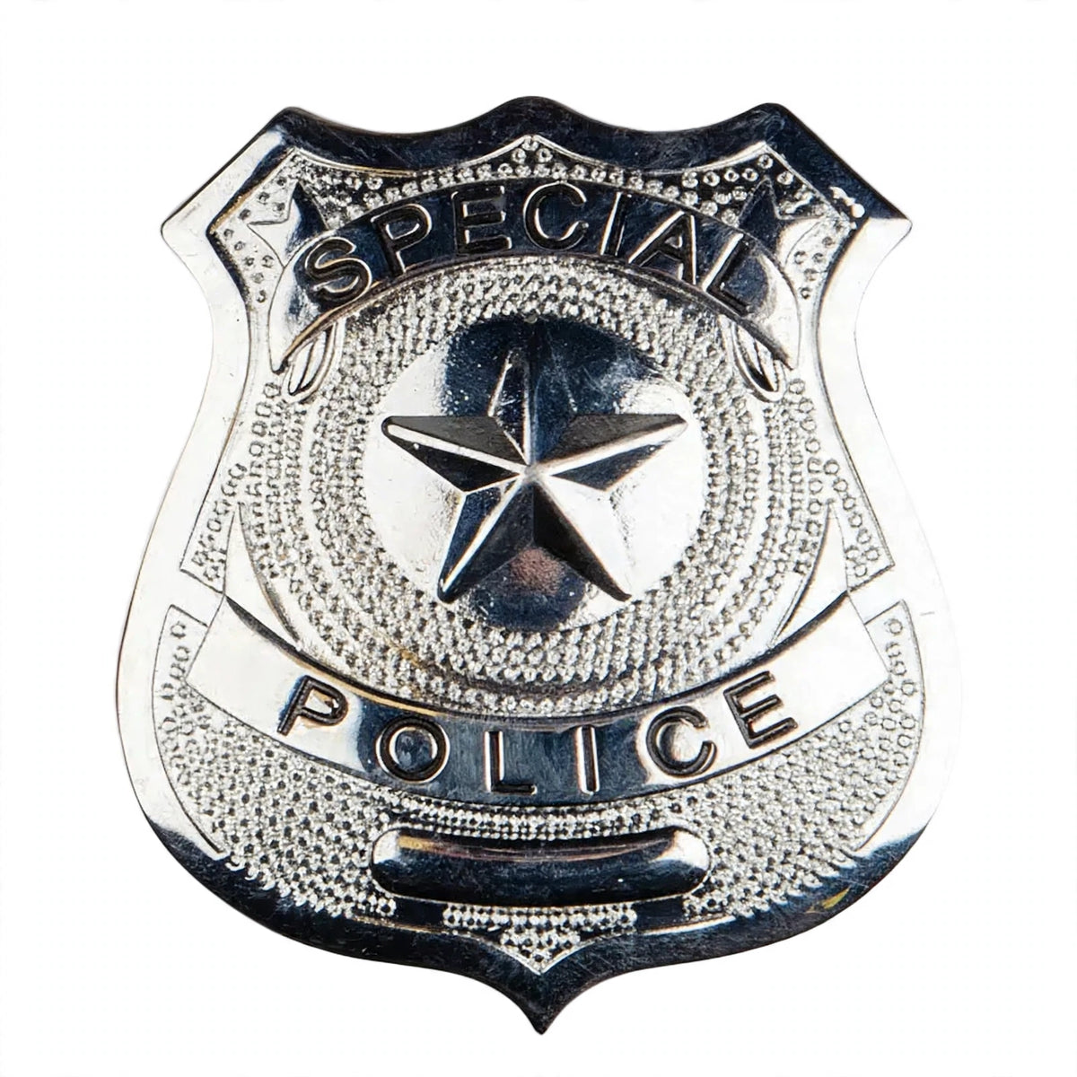 Close-up view of silver star-shaped police badge