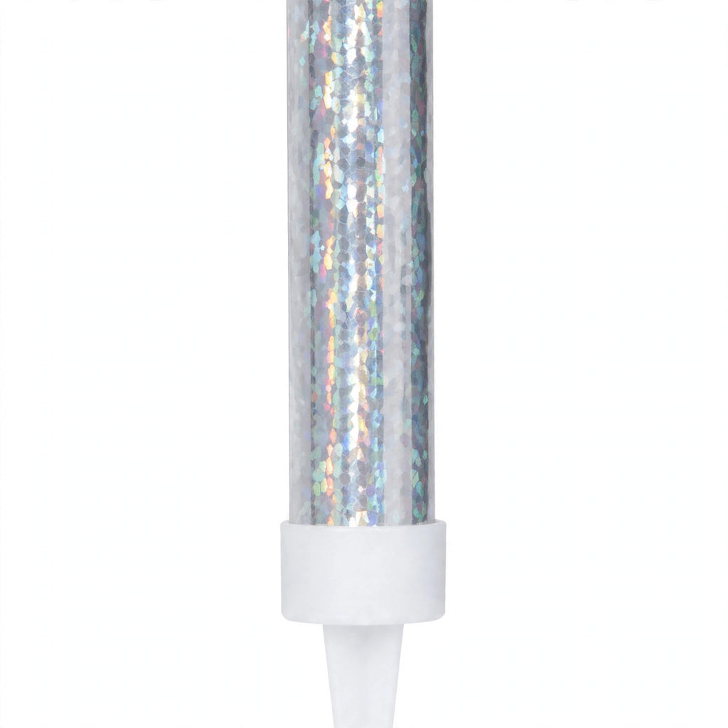 Close-up of silver prismatic ice fountain cake decoration with slim foil wrapping and pointed spike