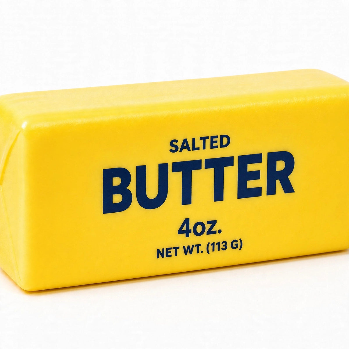 Close-up view of the salted butter squishy toy showing bright yellow wrapper and navy lettering