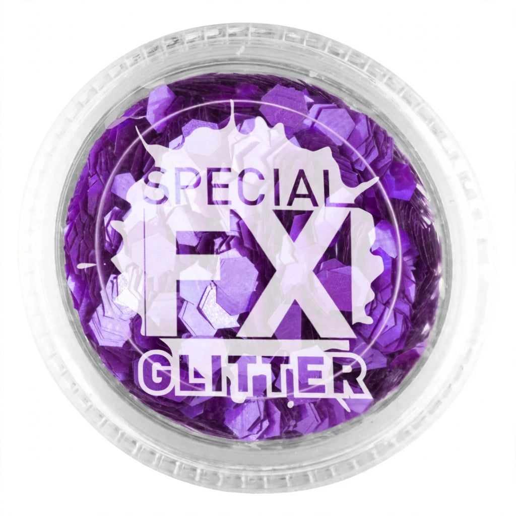 Close-up of purple loose glitter for face and body application