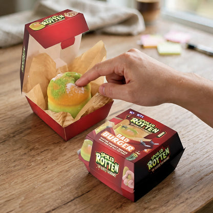 Spoiled Rotten Squishy Squeeze Decaying Burger toy displayed in its burger box
