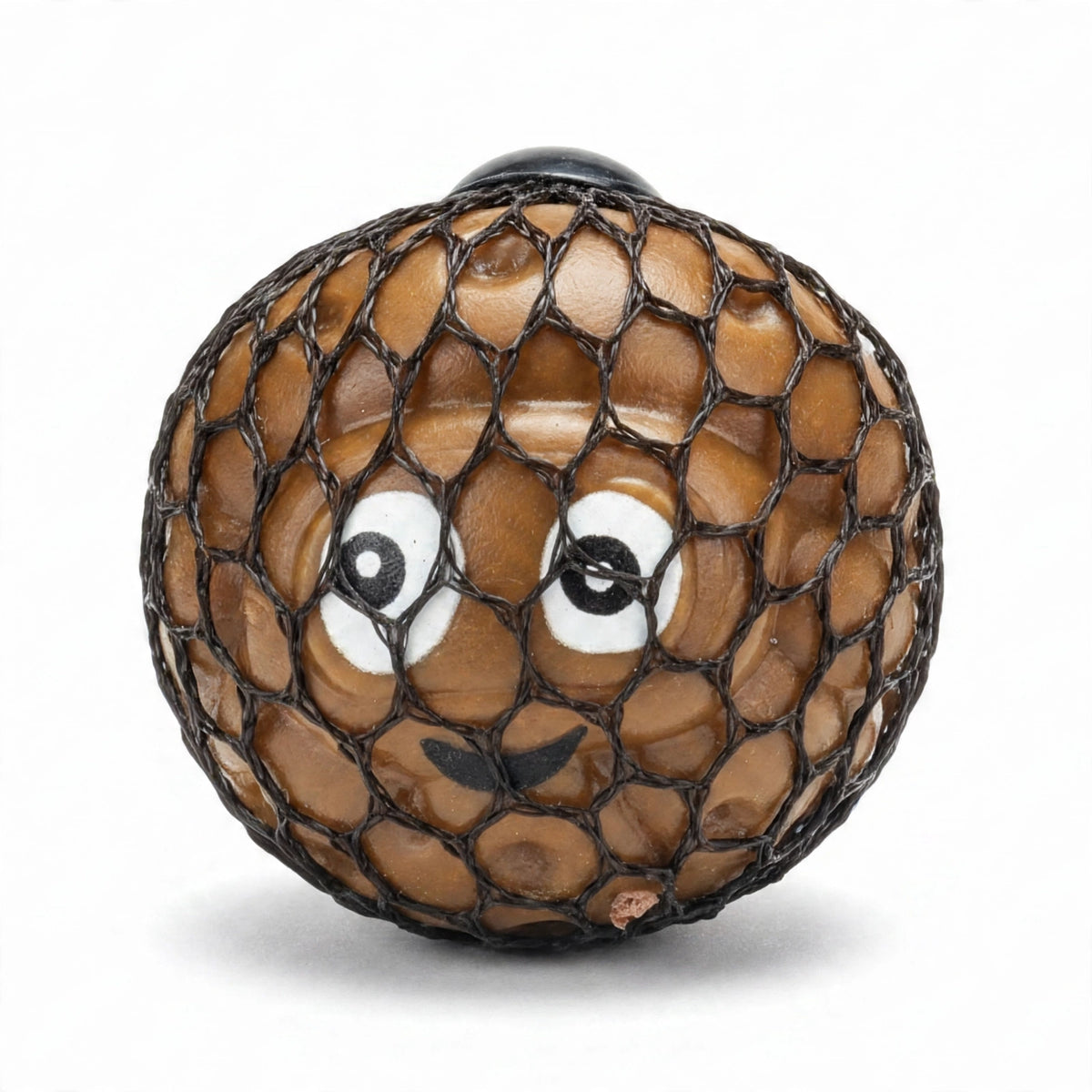 Close-up view of Squeezy Funny Face Poop 6.5cm squishy foam toy