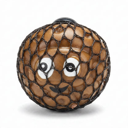Close-up view of Squeezy Funny Face Poop 6.5cm squishy foam toy