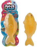 Squishy Sticky Icky Fishy amber orange novelty toy shown in packaging and out of packaging on white background