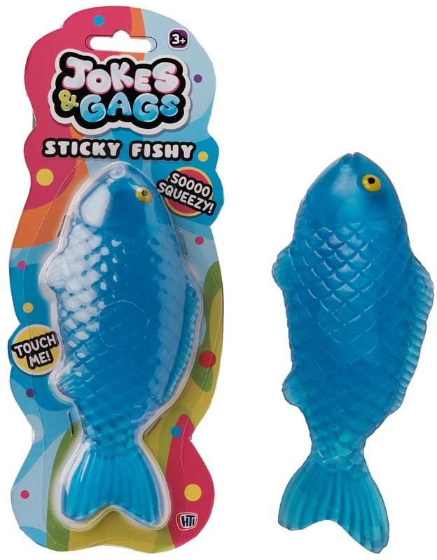 Squishy Sticky Icky Fishy sky blue novelty toy shown in packaging and out of packaging on white background