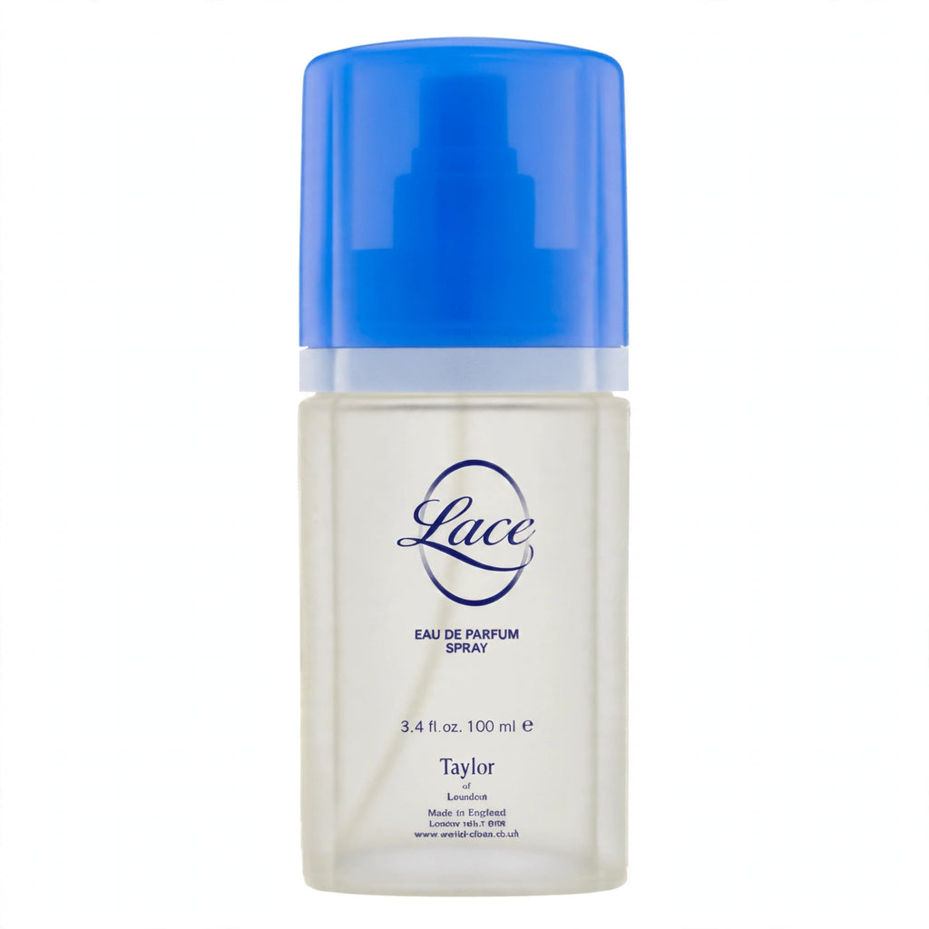 Close-up of Lace EDP Spray 100ml bottle showing white floral scroll gift box and royal blue cap
