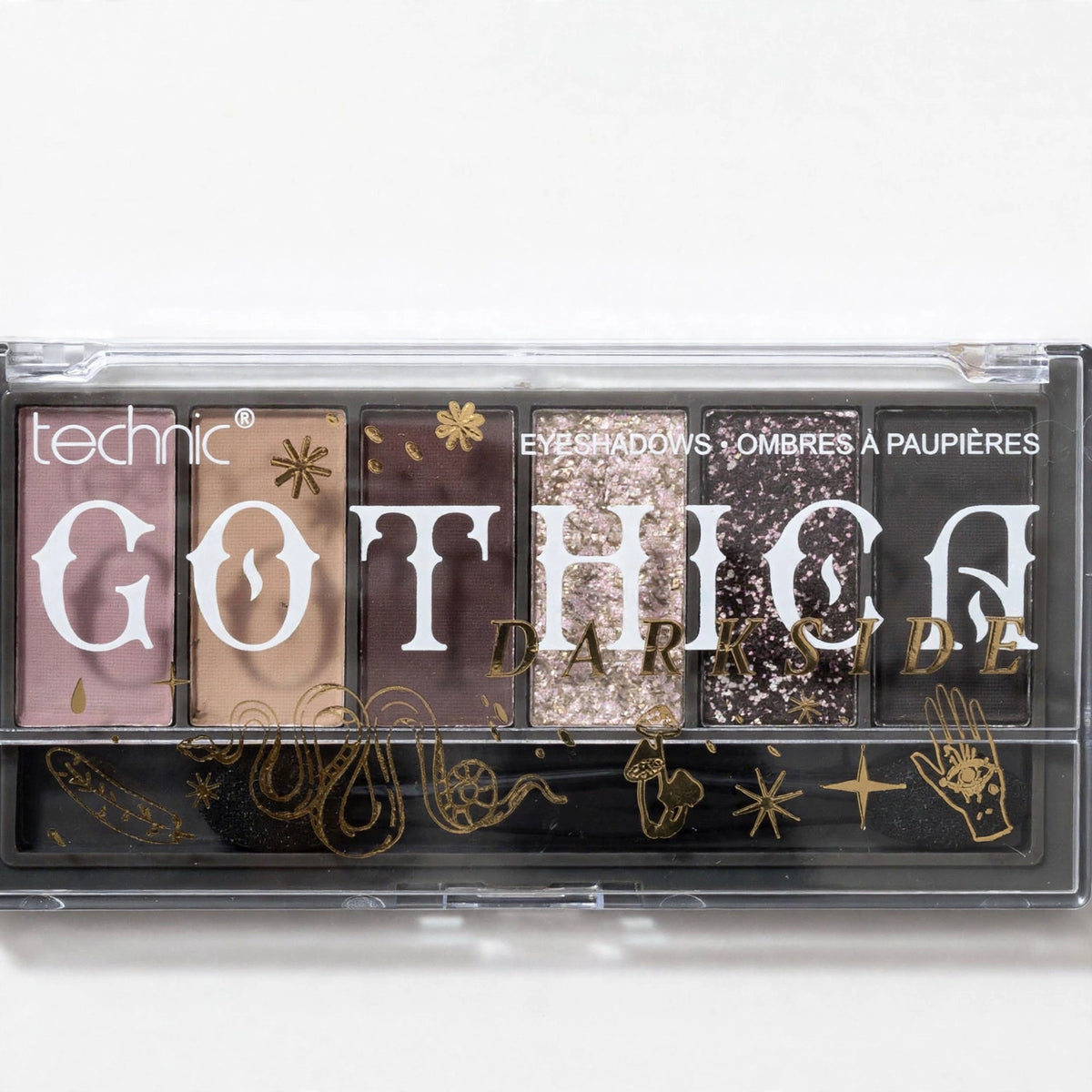 Close-up view of Technic Gothica Darkside Mini Eyeshadow Palette colors and texture