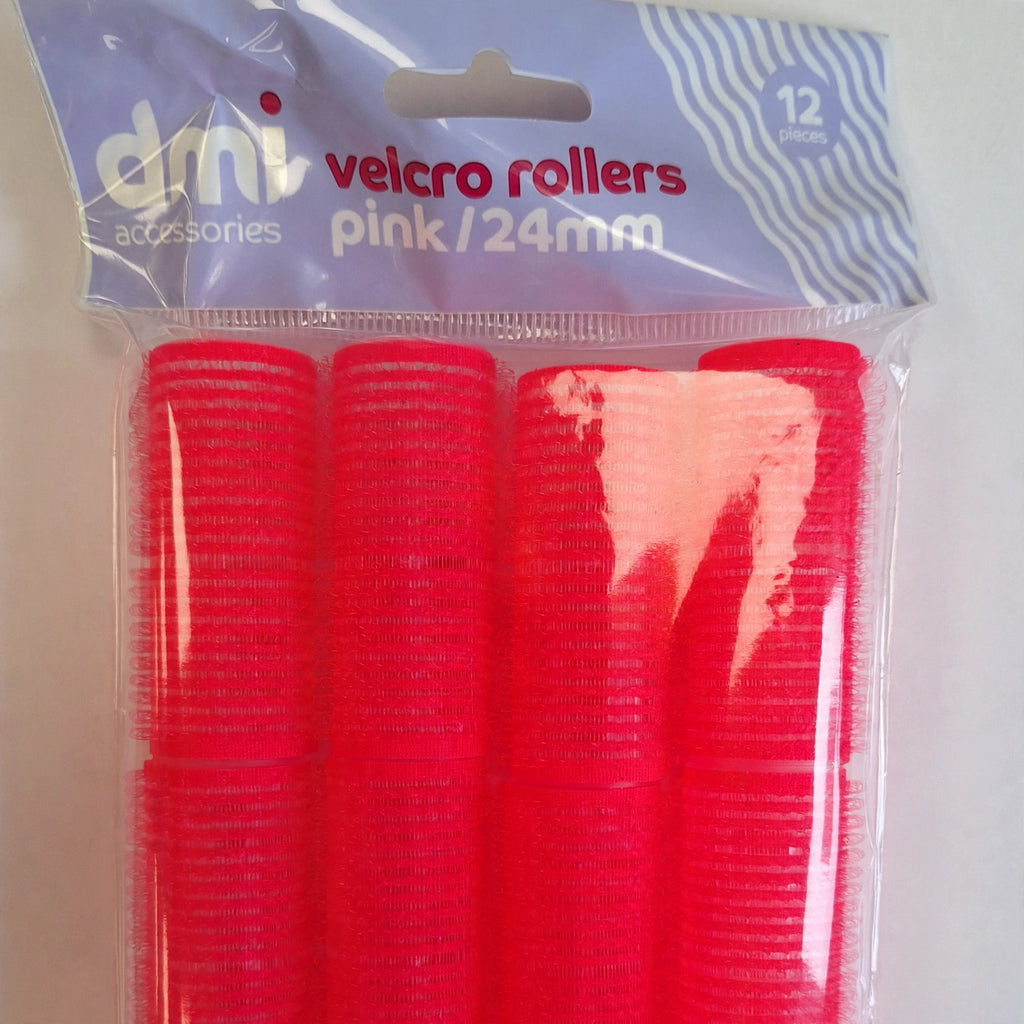 Close-up view of pink Velcro hair roller showing texture and size