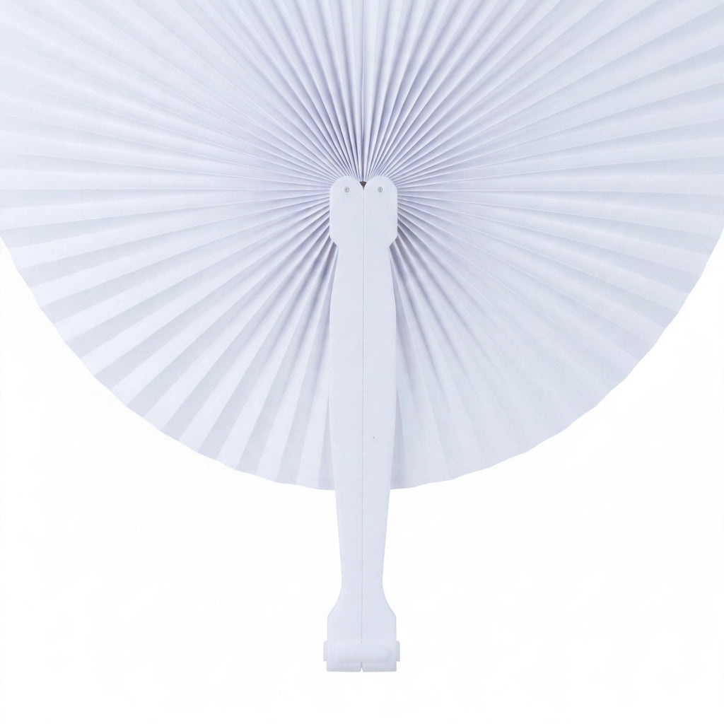 Close-up of white heart-shaped paper fan with white plastic handle