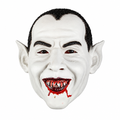 A vampire-style latex mask with a white face, black hair, pointed ears, and a wide grin showing red blood around the teeth, photographed on a plain white background.