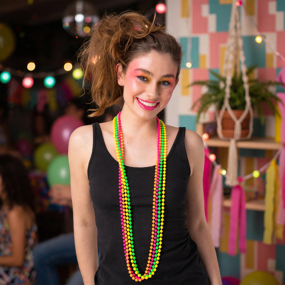 Model wearing Wicked Costumes 1980s Neon Bead Necklace Set at a 1980s party