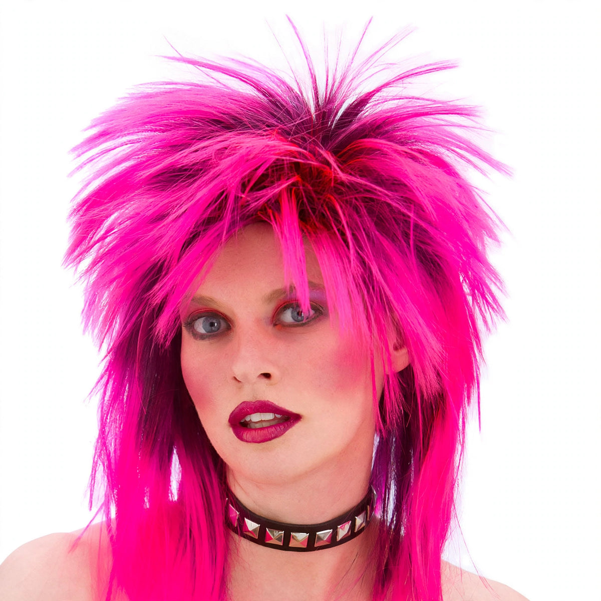 Close-up view of the women's 1980s spiky pink wig spikes