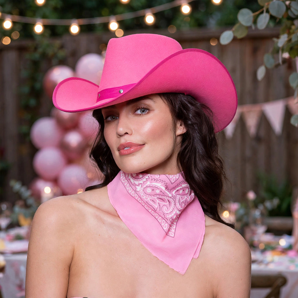 Baby pink bandana styled around neck, hair, or wrist for Wild West look