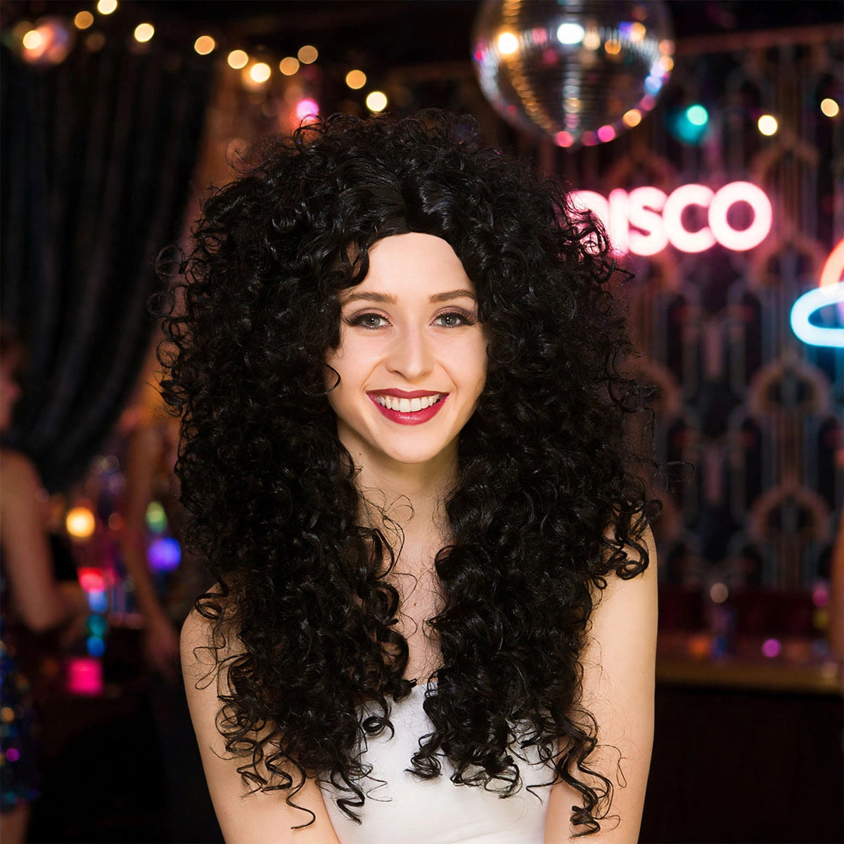 Women's long black curly wig styled for 80s, disco, Halloween or character costume