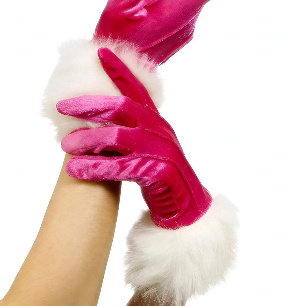 Close-up view of pink womens Santa Christmas gloves with white faux-fur trim